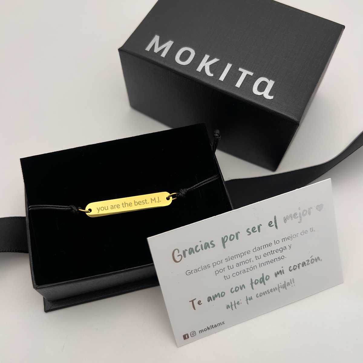 Pulsera tejida con placa grabada de Acero